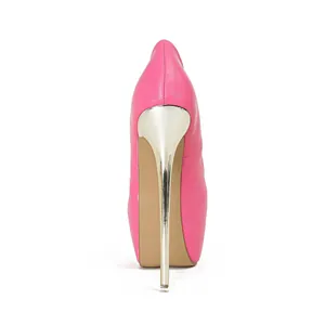 Rear view of pink platform stiletto high heels with metallic gold heel