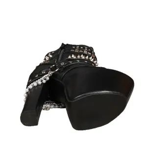 Detail view of 16cm super high heel platform ankle boots with studs and pearl chains.