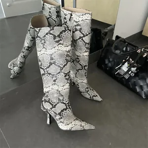 Pointed toe knee-high boots with chic grey snakeskin pattern and elegant stiletto heels
