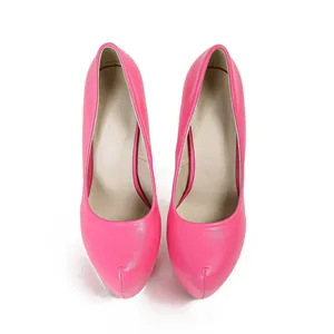 Close-up top view of elegant hot pink platform pumps featuring sleek stiletto heels.