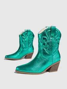 Detail view of metallic teal western cowboy boots with embroidery and chunky heel