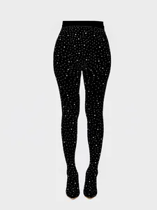 Detailed view of black rhinestone pantashoes with sparkling crystals and pointed toes