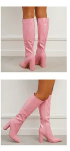 Detailed side view of pink croc-embossed pointed toe chunky heel knee-high boots with zipper