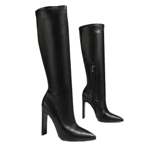 Elegant black pointed toe knee-high boots with tall stiletto heels for winter fashion