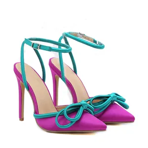 Elegant pointed toe stiletto high heels with stylish teal bow and ankle strap