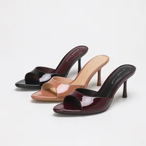 Glossy patent leather peep toe stiletto mules for women in black, nude, and burgundy