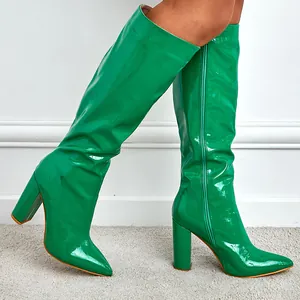 Fashionable women's pointed toe block heel knee high boots in green glossy crocodile pattern