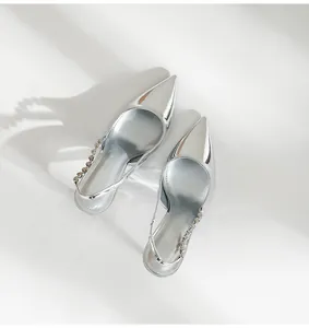 Elegant silver metallic pointed-toe slingback heels with rhinestone-embellished straps
