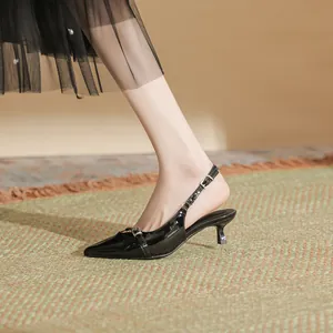 Elegant black pointed-toe slingback kitten heels for women with a decorative metal buckle