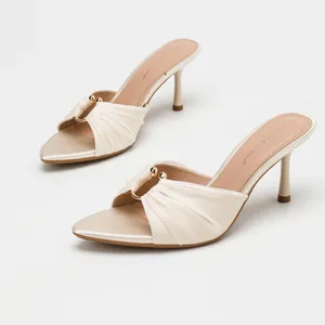 Elegant beige satin pleated high heel mule sandals with gold metallic hardware accents