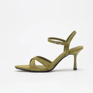 Elegant olive green suede stiletto sandals with ankle strap and cross-over design