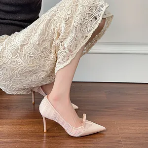 Elegant apricot pointed toe high heels with bow and pleated mesh detail for women