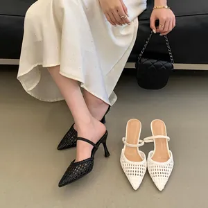Elegant pointed-toe woven hollow stiletto sandals for women shown in black and white