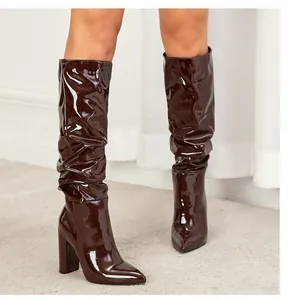 Slouchy patent leather mid-calf boots with pointed toe and high block heel for women