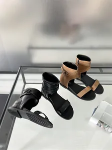 Stylish flat Roman sandals for women featuring buckle ankle wraps and side zippers.