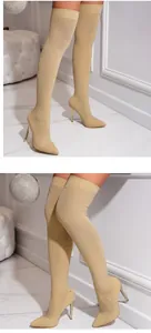 Side and front view of beige rhinestone-encrusted thigh-high boots with thin heels