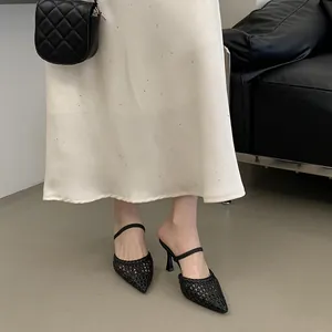 Elegant black woven pointed-toe high-heel mules featuring stylish ankle strap detail