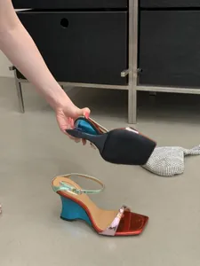 Detailed view of women's metallic gradient color-block wedge sandals with square toe