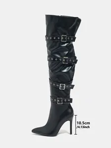 Black over-the-knee punk boots with stiletto heel and multiple buckled straps detail