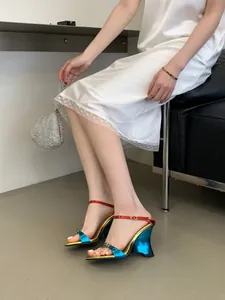 Stylish gradient metallic wedge sandals with colorful straps and unique curved heel