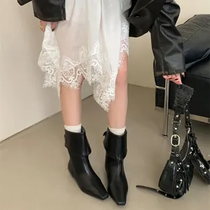 Stylish black leather ankle boots with foldable cuff and pointed toe for women