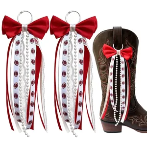 Red American football western cowboy boot bow charm with decorative ribbon streamers