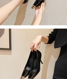 Close-up view of elegant black patent leather high heels with metallic toe caps.