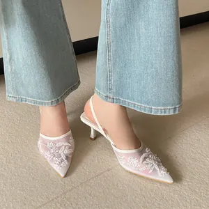 Elegant white pointed-toe mesh slingback heels with exquisite floral embroidery