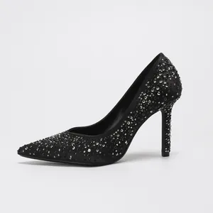Elegant black pointed-toe stiletto pumps with shimmering silver rhinestone embellishments