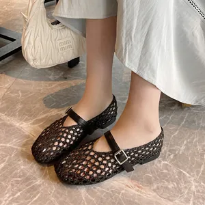 Elegant women's black woven hollow-out Mary Jane flats with stylish buckle strap