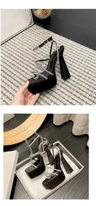 Detailed view of black platform sandals with sparkling rhinestone straps and high block heels