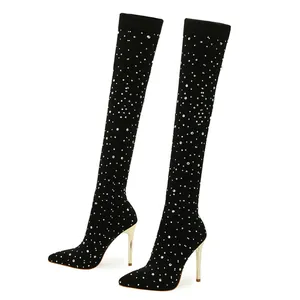 Black pointed-toe over-the-knee boots with sparkling rhinestones and gold thin heels