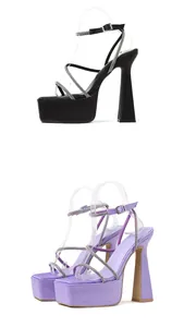 Stylish lavender and black platform sandals with rhinestone straps and chunky heels