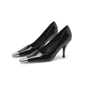 Elegant black patent leather pointed toe pumps with silver metal cap and stiletto heel