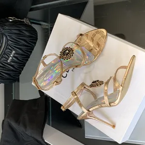 Elegantes sandalias doradas talla 42 con tacón alto, pedrería y plantillas irisadas
