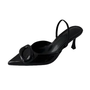 Elegant black patent leather pointed-toe slingback high heels with decorative square buckle