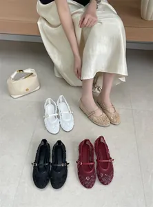 Collection of embroidered mesh Mary Jane flats in four elegant colors with model display