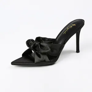 Elegant French pointed-toe black satin high heel sandals with a stylish bow knot detail.