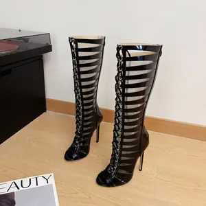 Sexy black patent leather stiletto knee-high gladiator boots with horizontal cutouts.