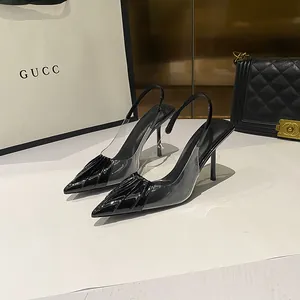 Elegant black pointed-toe slingback high heels with transparent PVC panels for women.