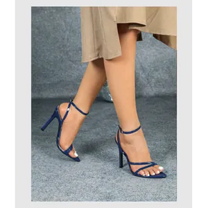 Elegant blue patent leather pointed toe high heel sandals with cross straps