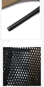 Detailed view of black stiletto heel and breathable honeycomb mesh fabric on sandals.