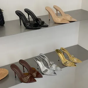 Detail view of pointed toe high heel mules with transparent straps in various colors