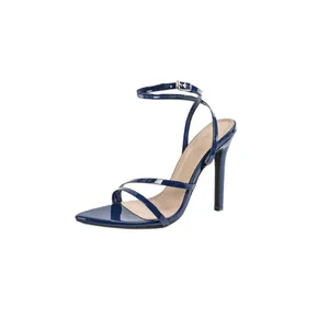 Elegant navy blue patent leather stiletto sandals with pointed toe and crisscross straps