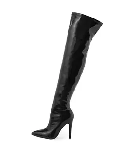 Side view of elegant black patent leather thigh-high boots with pointed toe and stiletto heel