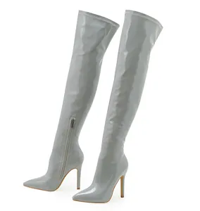 Elegant grey patent leather over-the-knee boots with pointed toe and stiletto heel.