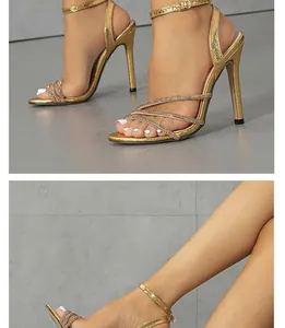 Detailed view of sexy gold metallic stiletto sandals featuring sparkling rhinestone straps.