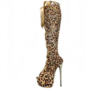 Close-up view of leopard print gladiator boots with lace-up design and stiletto heels
