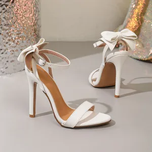 Elegant white bow ankle strap high heel sandals with slim stiletto heel for women