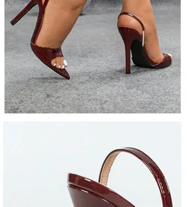 Detalle de elegantes zapatos de tacón destalonados en charol granate con punta fina